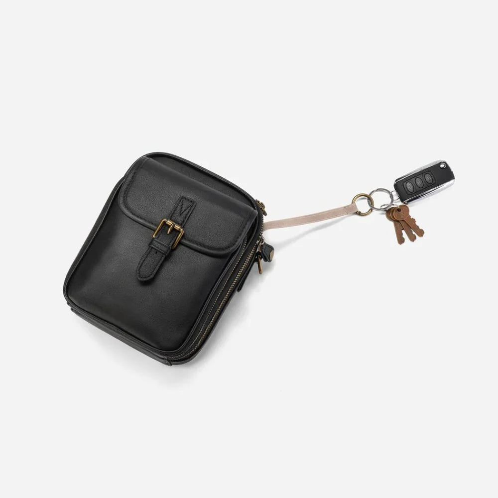 Bolso bandolera compacto de piel para mujer